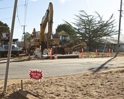 ALL TORE UP:  The San Luis Obispo County Board of Supervisors narrowly delayed the approval of more than $4 million in contract amendments for the Los Osos Wastewater project, which critics contend has run grossly over-budget and has led to significant inconveniences thanks to the ongoing road construction (pictured here at Fern Avenue). - PHOTO BY STEVE E. MILLER