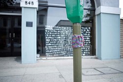 KNIT TAG :  Even a humdrum parking meter looks a little cozier with knitted apparel. - PHOTO BY STEVE E. MILLER