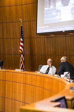 AGREE TO DISAGREE:  Bruce Gibson (right) talks to Frank Mecham (left) during a break before the Supervisors discussed the proposed Paso water district. In a deciding vote Mecham changed his position from previous votes, thereby shifting the Supervisors&rsquo; position on a bill currently going through the state senate. - PHOTO BY HENRY BRUINGTON