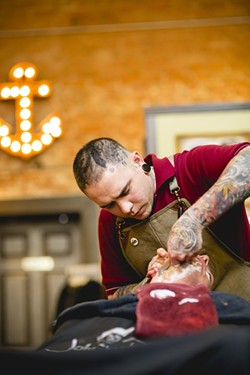 TWO BITS?:  Sammy Mejia is already proving to be a popular local choice for haircuts and shaves at The Ritual. - PHOTO BY HENRY BRUINGTON