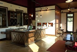 BRIGHT WINES :  The tasting room is large, bright, and inviting with interior decoration designed by Mrs. Stolo.