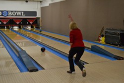 STRIKE:  Pismo Beach City Council candidate Marcia Guthrie, seen here bowling during her election night event, is locked in a dead heat with incumbent Mary Ann Reiss for a council seat as of Nov. 5. Both candidates are awaiting the tabulation of about 850 uncounted ballots in Pismo. - PHOTO BY RHYS HEYDEN