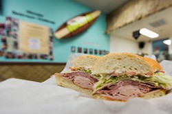 THE DESTROYER CHALLENGE IS ON:  Scarf two of these bad boys down in less than more 17 minutes and you could earn your photo on the Kona&rsquo;s Deli wall. Talk about bragging rights! - PHOTO BY KAORI FUNAHASHI
