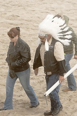 ON THE WAR PATH :  One Indian motorcycle enthusiast donned a chief&rsquo;s headdress. - PHOTO BY STEVE E. MILLER