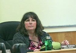TORCHES AND PITCHFORKS :  Former Cambria Community Services District general manager Tammy Rudock (pictured) sat an April 28 board of directors meeting, approximately 24 hours before being canned. Not pictured are the approximately 300 residents calling for her immediate termination. - PHOTO BY MATT FOUNTAIN