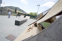 THRASHED SLO :  parks officials purchased $50,000 worth of temporary ramps for the city&rsquo;s skate park. But with the original equipment literally disintegrating and a new concrete park still years away and hundreds of thousands of dollars short from completion, the new equipment is just a Band-Aid until a permanent park is built. - FILE PHOTO BY STEVE E. MILLER