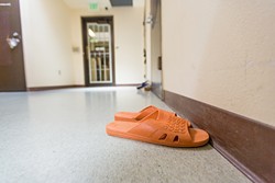 SUMMER SANDALS:  Kids neatly place their shoes outside rooms while they are inside. - PHOTO BY KAORI FUNAHASHI