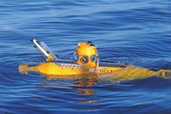 A YELLOW SUBMARINE :  The Delta submarine researchers used to visit the wreck is so small, the operator&rsquo;s chair straddles the passenger, who must lie prone and peer out of a separate porthole. - PHOTO BY ROBERT SCHWEMMER, NOAA