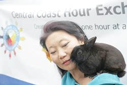HOUR EXCHANGE WANTS YOU! :  Briana Shean and her little bunny Bartholomew explain all about the Central Coast Hour Exchange. - PHOTO BY GLEN STARKEY