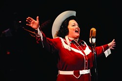 SING IT, PATSY!:  Kitty Balay, pictured, belts her heart out in Always &hellip; Patsy Cline, reprising her role as the beloved country singer. - PHOTO BY LUIS ESCOBAR/REFLECTIONS PHOTOGRAPHY STUDIO