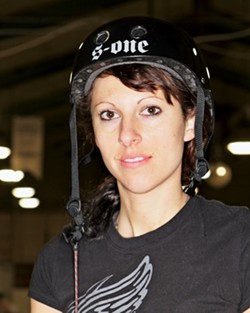 NAME: HILLFIRE:  AGE: 26 - OCCUPATION: hairstylist - NUMBER: x - POSITION: jammer - AVERAGE POINTS PER GAME: 50 - GAMES PLAYED: 10 - PHOTO BY STEVE E. MILLER