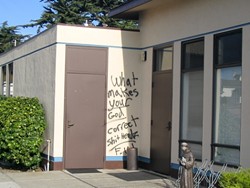 WHAT IN GODS NAME? :  Vandals armed with spray paint hit two churches in central San Luis Obispo County early on Oct. 4. Police declared both incidents hate crimes and suspect they could be related. - PHOTO COURTESY OF TOM SALMON