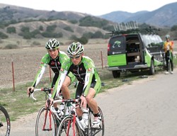 SPEED MACHINES :  Brian Sheedy, left, and Garrett Peltonen are members of Team Priority Health, a Michigan-based team training for the Amgen Tour of California in the Santa Maria Valley. Cyclists will make their way to San Luis Obispo on Feb. 22. - PHOTO BY CRAIG SHAFER