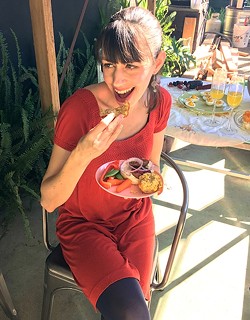 SHE LIKES TO EAT:  SLO Tribune's Ticket Editor Sarah Daly infiltrates brunch, no doubt gathering intel for the other side. She makes a mean basket of corn muffins. - PHOTO BY HAYLEY THOMAS