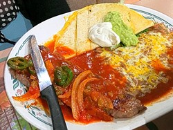 WOULD YOU LIKE YOUR STEAK 'WET?':  The massive Cazuelas steak dinner comes smothered in red sauce and is served with beans, warm tortillas, salad, and a gooey cheese quesadilla. - PHOTO BY REID CAIN