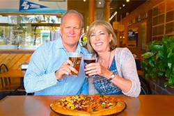POWER COUPLE :  Jeff and Laura Ambrose built a Woostock&rsquo;s Pizza empire that&rsquo;s flourished in California college towns for 30-plus years (without the help of kale or any other trendy topping). - PHOTO COURTESY OF WOODSTOCKS PIZZA