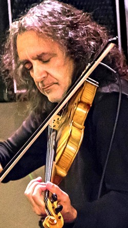 CANDLELIGHT :  Sal Garza (pictured) and the Candlelight Strings plays a healing concert on July 29 in St. Benedict&rsquo;s Episcopal Church of Los Osos in response to the Orlando nightclub massacre and other recent tragic events. - PHOTO BY CARL ADAMS
