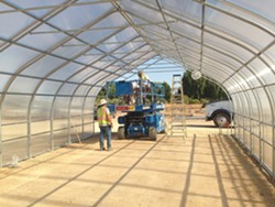 CONSTRUCTING New plant science courses will be offered at Cuesta College, and its north county campus is gearing up with a greenhouse to facilitate the classes. - PHOTO COURTESY OF CUESTA COLLEGE AGRICULTURE INSTRUCTOR DEAN HARRELL