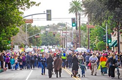 STILL FIGHTING The Women's March SLO will hold a "hear our vote" rally on Jan. 20, just one day short of the one-year anniversary of the organization's 2017 march. - FILE PHOTO BY JAYSON MELLOM