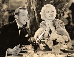 THE LADY OF THE CASTLE Marion Davies (right), actress and mistress of William Randolph Hearst, starred in the 1933 film Going Hollywood with Bing Crosby. The classic romantic flick closed out the first ever Cambria Film Festival on Feb. 11. - IMAGE COURTESY OF COSMIPOLOITAN PRODUCTIONS AND MGM