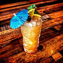 COCONUT DREAMS As strong as they come, Sidecar's "Bahama Mama" is made with Gosling's Black Seal rum, Ron Matusalem Platino rum, Havana Club rum, Clement coconut liqueur, pineapple, orange, grenadine, and Angostura bitters. - PHOTO COURTESY OF SIDECAR