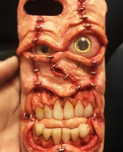 CREEPY CRAWLY Grover Beach artist Joe Rowles crafts functional pieces like this cellphone case that he classifies as "grotesque art." - PHOTO COURTESY OF JOE ROWLES