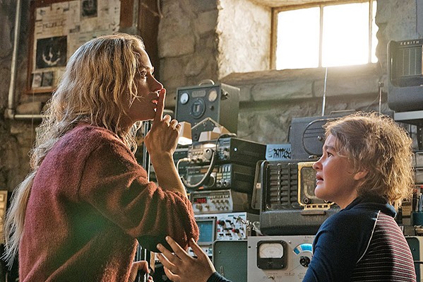 DON'T MAKE A SOUND Evelyn Abbott (Emily Blunt, left) signals to her deaf daughter Regan (Millicent Simmonds, a deaf actor) to be quiet lest a creature that hunts by sound discovers them. - PHOTO COURTESY OF PARAMOUNT PICTURES