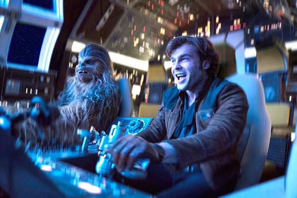 HIT IT! Chewbacca (Joonas Suotamo) and Han Solo (Alden Ehreneich) make their escape in this origin story set long before the rebellion. - PHOTO COURTESY OF WALT DISNEY STUDIOS