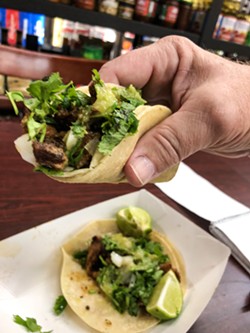 ABUELA RODRIGUEZ's SECRET RECIPE Sidewalk Market's al pastor street tacos, made by Gregorio and Alejandro Rodriguez, are the bomb, and they're only $2 each! - PHOTO BY GLEN STARKEY