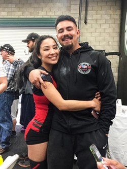 BY HER SIDE Uriel Tapia (right), who's also a competitive powerlifter, first introduced Denise Juarez to the weight room and served as her trainer for about two years. - PHOTO COURTESY OF DENISE JUAREZ