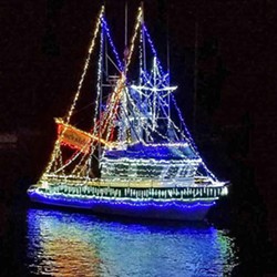 HOLIDAY AT SEA For 33 years, Morro Bay has been lighting up its waters with the Morro Bay Lighted Boat Parade during the first weekend in December. - PHOTO COURTESY OF TERI BAYUS