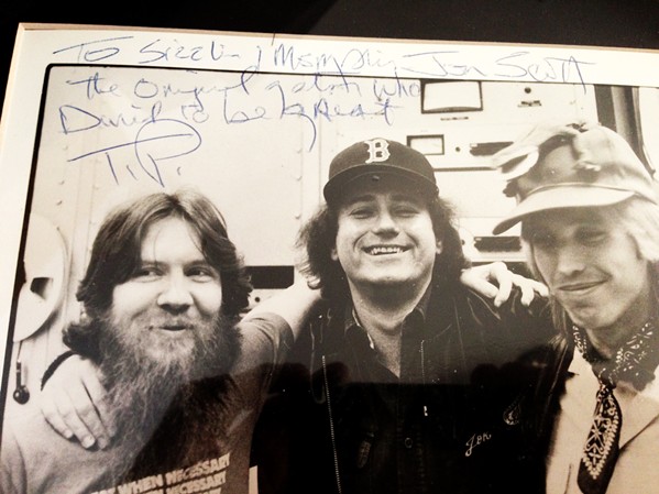 A HIGHER PLACE Author Jon Scott (center) and music legend Tom Petty (right) met way back when Scott was working for a record label and Tom Petty and the Heartbreakers were still trying to make it as a band. - PHOTO COURTESY OF JON SCOTT