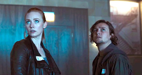GRAVE EXPECTATIONS Deborah Ann Woll and Logan Miller play complete strangers who must work together in order to survive, in Escape Room. - PHOTO COURTESY OF COLUMBIA PICTURES