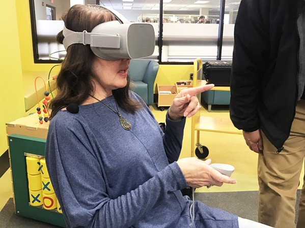 SO REAL A SLO County Library patron tries out the Oculus Go, a virtual reality device made by Facebook. The Oculus Go is just one device that can be checked out as part of the Mobile MakerKit program. - PHOTOS COURTESY OF THE SLO COUNTY LIBRARY