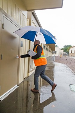 OUT OF SIGHT Knocking on the door, pulling on the handle, and asking for someone to open the door are just a few tactics that SLO High Principal Leslie O'Connor uses to check if classrooms are following lockdown procedures. - PHOTOS BY JAYSON MELLOM