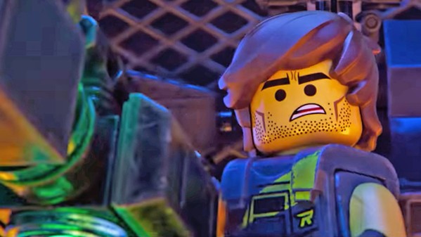 LEGO FACIAL STUBBLE?!? Rex Dangervest (Chris Pratt) comes to the rescue after Lego Duplo invaders from space attack, in The Lego Movie 2: The Second Part. - PHOTO COURTESY OF ANIMAL LOGIC