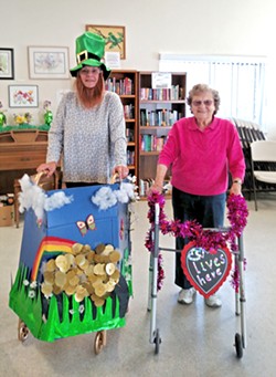 GETTING CRAFTY (from left to right) Central Coast Senior Center board member Sandy Stuart and charter member Pearl Cole display their customized walkers. - PHOTO COURTESY OF LONI KUENTZEL