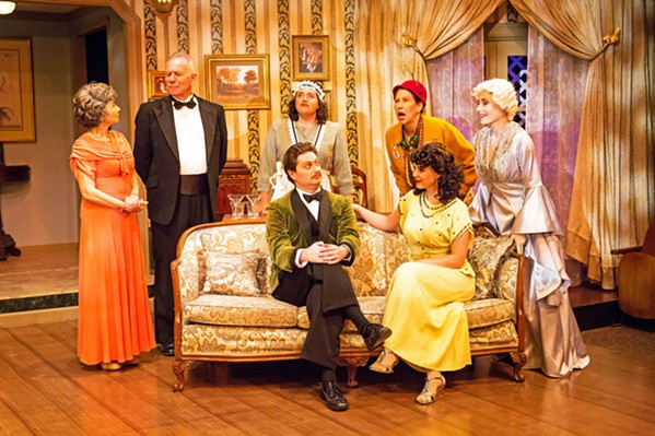 HAUNTED When a night of fun goes awry, the dead and the living must duke it out in No&euml;l Coward's comic play, Blithe Spirit. From left to right: Mrs. Violet Bradman (Rosh Wright), Dr. George Bradman (Gary Paul-Clark), Edith (Kerry DiMaggio), Charles Condomine (Toby Tropper), Ruth Condomine (Rachel Tietz), Madame Arcati (Suzy Newman), and Elvira Condomine (Katie Worley-Beck). - PHOTOS COURTESY OF RYLO MEDIA DESIGN