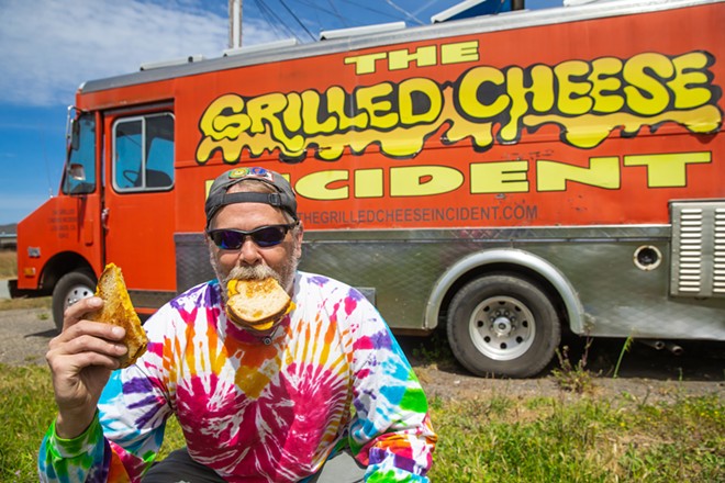 MORE CHEESE, PLEASE Grilled cheese master chef Mike McGourty puts his heart and soul into the gooey goodness he dishes out from The Grilled Cheese Incident food truck. And New Times’ readers like what he’s laying down. - PHOTO BY JAYSON MELLOM