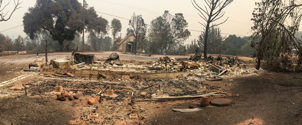 SCORCHED A Lake Nacimiento home is destroyed by the 2016 Chimney Fire in San Luis Obispo. - FILE PHOTO BY JAYSON MELLOM