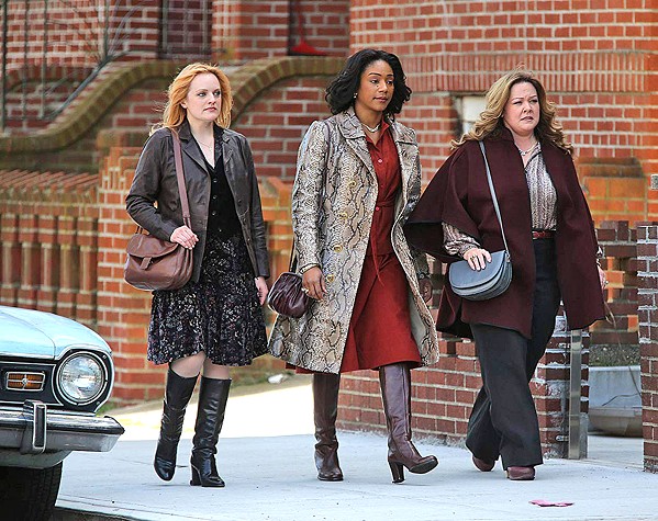 TAKE CHARGE In 1970s New York, three gangsters' wives&mdash;(left to right) Claire (Elizabeth Moss), Ruby (Tiffany Haddish), and Kathy (Melissa McCarthy)&mdash;decide to continue running their Hell's Kitchen rackets after the men are imprisoned, in The Kitchen. - PHOTO COURTESY OF BRON STUDIOS
