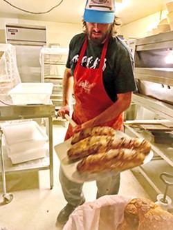 SINCE 4 A.M. Baker Marcus Marren, who has been working with Mark Stambler since their days in Los Angeles, starts baking breads, pastries, cookies, cinnamon rolls, and tarts while the rest of the Central Coast is still snoozing. - PHOTOS BY BETH GIUFFRE