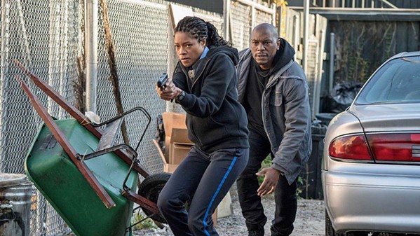 IN OVER HER HEAD Rookie cop Alicia West (Naomie Harris), with the help of Milo 'Mouse' Jackson (Tyrese Gibson), must navigate a dangerous world filled with criminals and corrupt cops, in Black and Blue. - PHOTO COURTESY OF SONY PICTURES