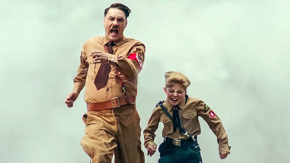 NAZI POWER Jojo (Roman Griffin Davis, right) and his imaginary friend "Adolf" (writer-director Tailka Waititi) feel the Nazi spirit during Hitler Youth training. - PHOTOS COURTESY OF PIKI FILMS