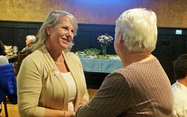 MORE MONEY MORE PROBLEMS Mayor Caren Ray Russom greets a supporter at an election night party in 2018. Now Russom is fighting for a pay increase for Arroyo Grande City Council. - FILE PHOTO BY CHRIS MCGUINNESS