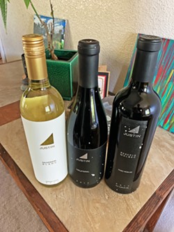 FRESH OUT THE BOX Justin Vineyard &amp; Winery sent a three-pack to my house for a Instagram Live virtual tasting with founder winery Justin Baldwin. - PHOTO BY CAMILLIA LANHAM