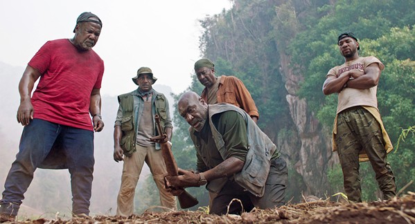 BLOOD IS THICKER Four Vietnam Vets&mdash;(left to right) Melvin (Isiah Whitlock Jr.), Eddie (Norm Lewis), Paul (Delroy Lindo), Otis (Clarke Peters)&mdash;and Paul's son, David (Jonathan Majors), go to Vietnam to repatriate the remains of the soldiers' squad leader and find buried CIA gold they hid, in Spike Lee's excellent Da 5 Bloods, screening on Netflix. - PHOTO COURTESY OF 40 ACRES &amp; A MULE FILMWORKS
