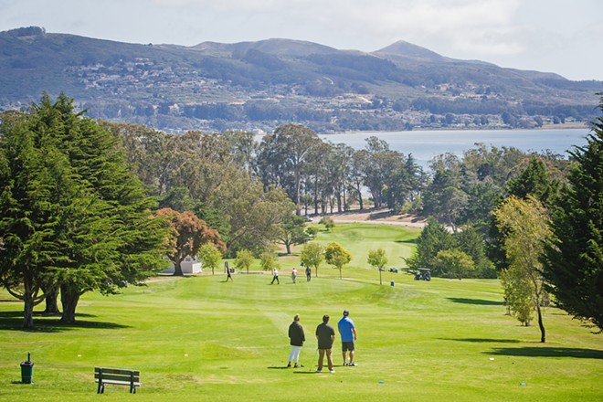 GOLF WITH A VIEW You can affordably swing a club while gazing out at the sun glinting off the ocean from anywhere at the Morro Bay Golf Course. - PHOTO BY JAYSON MELLOM