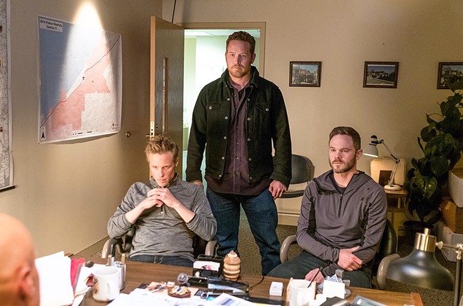 KIN After his fianc&eacute;e is abducted, Roman (Ashton Holmes, left) joins her brothers Deklan (Cole Hauser, center) and Brandon (Shawn Ashmore) in finding her and dispatching her abductors, in Acts of Violence streaming on Netflix.