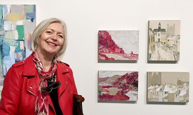 FAB FOUR Orcutt-based artist Denise Gimbel poses next to four of her recent paintings, currently featured in SLOMA's group show, Finding Spaces. On display from left to right, top to bottom: Rosy Outlook Morro Rock, Safe and Secure, Rosy Outlook Pismo Beach, and All Tucked In.